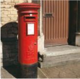 Post box A red cylindrical metal box put in public places in which people put the letters they want to send.