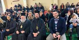 χαίροντας τόν στενό του συνεργάτη καί Πρωτοσύγκελλο π.