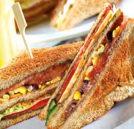 ΣΑΝΤΟΥΙΤΣ & ΤΟΡΤΙΓΙΑ SANDWICHES & TORTILLAS ΣΑΝΤΟΥΙΤΣ ΛΑΧΑΝΙΚΩΝ Φρυγανισμένο ψωμί του τοστ σικάλεως με πάστα μαύρης ελιάς, καλαμπόκι, ντομάτα, ψητή κόκκινη πιπεριά Φλωρίνης, σαλάτα iceberg, αγγούρι