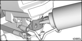 Τοποθετήστε το στόμιο της φιάλης με το TSL στο επάνω, κεντρικό άνοιγμα της γρίλιας που υπάρχει στην μπροστινή πλευρά του μηχανήματος βαφής. b.