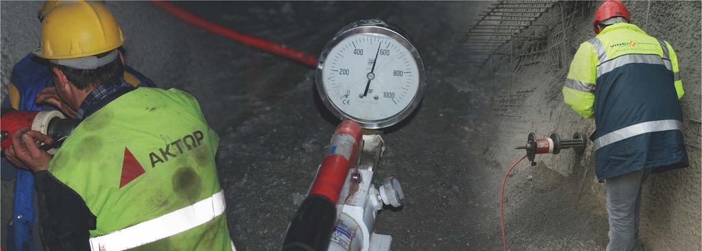 monitoring the applied load, a cylinder resting base and suitable gripping device.