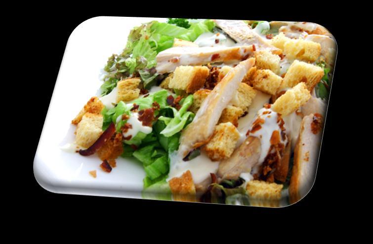 Σαλάτες / Salads Σαλάτα του Καίσαρα Ceasar s salad Κομματάκια από κοτόπουλο μέσα σε δροσερό μαρούλι, μαζί με καλαμπόκι, κρουτόν,