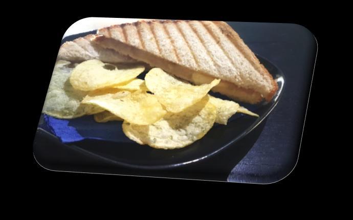 Σάντουϊτς / Sandwiches Τοστ / Toast Ζαμπόν ή γαλοπούλα, τυρί ένταμ και πατατάκια Toasted bread with ham or smoked turkey, edam cheese and potato chips.