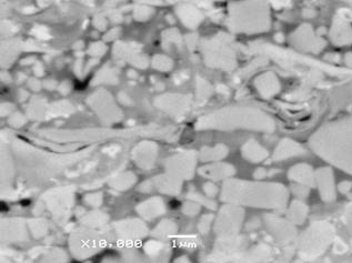 Κεφάλαιο 7: Επικαλύψεις WC 12Co 2 1 (γ) SEM x10.000 Εικόνα 7 2: Επικάλυψη νανοφασικής πούδρας WC 12Co με τις βέλτιστες συνθήκες ψεκασμού (α) ΟΜ x200 (β) ΟΜ x500 (γ) SEM x10.