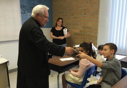 SUNDAY SCHOOL VASILOPITA LESSON Fr James visited the Sunday School students on January 10 to show them how