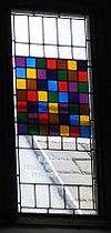 Stained glass window in the dining hall of Caius College,, in
