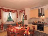 Apartman za 2 do 4 osobe, 60-70 m 2, ima dnevni boravak, spavaêu sobu, odvojeni WC i mini-bar.