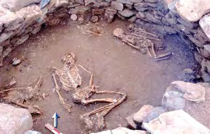 The dead were buried on the grave s floor either in a contracted position during the Mycenaean period, or in a supine position during the Protogeometric-Early Geometric period along with grave goods