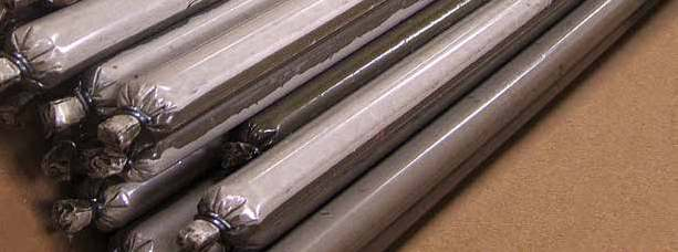 After drilling, the desired number of capsules are inserted into the bore-hole followed by the rock-bolt. The end of the rock-bolt is cut so as to form an angular tip to ease membrane rupture.