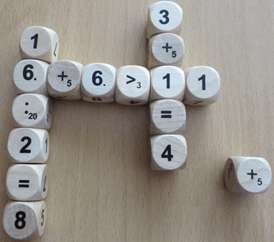 Názov: Matematika v kocke Téma: Prirodzené čísla Ročník: piaty až deviaty Cieľ: precvičenie základných matematických operácií Druh hry: spoločenská hra Pomôcky: hra Matematika v kocke Využitie: