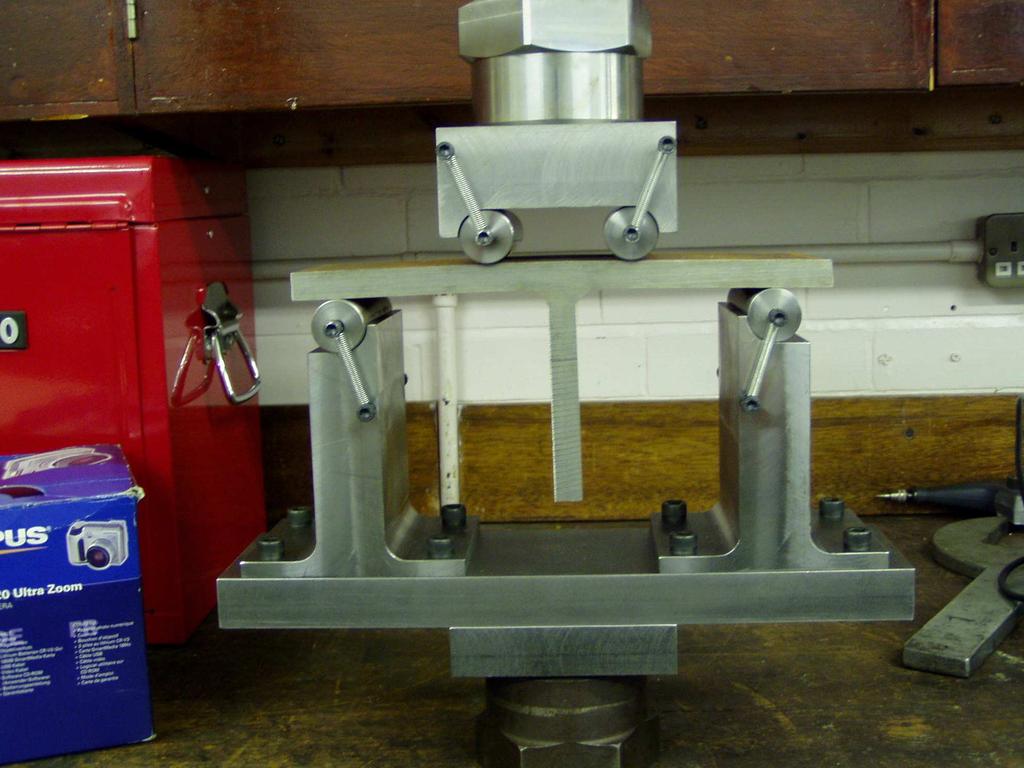 single-edge-notched bend (SENB) specimens (see Figure 4) machined from the parent plate were tested under 3-point bending to determine the CTOD critical displacement (Figure 4).