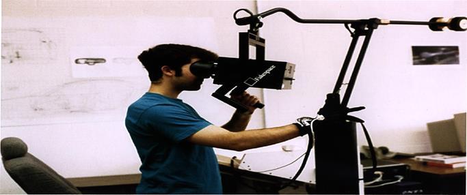 Boom (Binocular omni-orientation monitor) (βλ. εικόνα 1.4): αποτελεί μια συσκευή ανίχνευσης που αποτελείται από οθόνες και ένα οπτικό σύστημα, τα οποία είναι τοποθετημένα μέσα σε ένα κουτί.