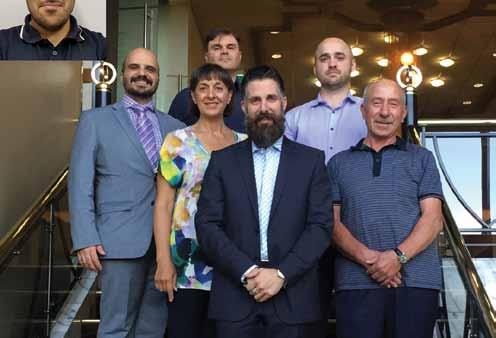 au Back Row (Left to Right): Inset - Manolis Harkiolakis (Vice President), Nick Vazenios (Committee Member), George Paterakis (Treasurer), Douglas Hill