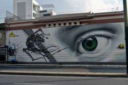 Ασχολείται με το γκράφιτι από το 1998 και με τη street art από το 2005. Ξεχωρίζει για τα paste up συμβολικά και σκληρά πορτρέτα του στους δρόμους της Αθήνας.