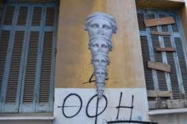 ΜΒ Το εντυπωσιακό έργο του Βασίλη Μαργκοσιάν με τίτλο Δεν λέω, καλά περνάω, βρίσκεται επί της Μ. Αλεξάνδρου και Μυκηνών γωνία.