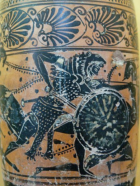 διακοσμητική του χρήση στην Ελληνική τέχνη. Ήλιος της Βεργίνας σε ανάγλυφο που απεικονίζει τον θεό Ήλιο στο άρμα του, αρχές 4ου αι.