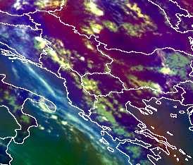Στην εικόνα 46δ διακρίνονται µέσα σε µαύρο κύκλο τα νέφη κατακόρυφης ανάπτυξης στην περιοχή όπου η ψυχρή µάζα είναι ξηρή, τα οποία