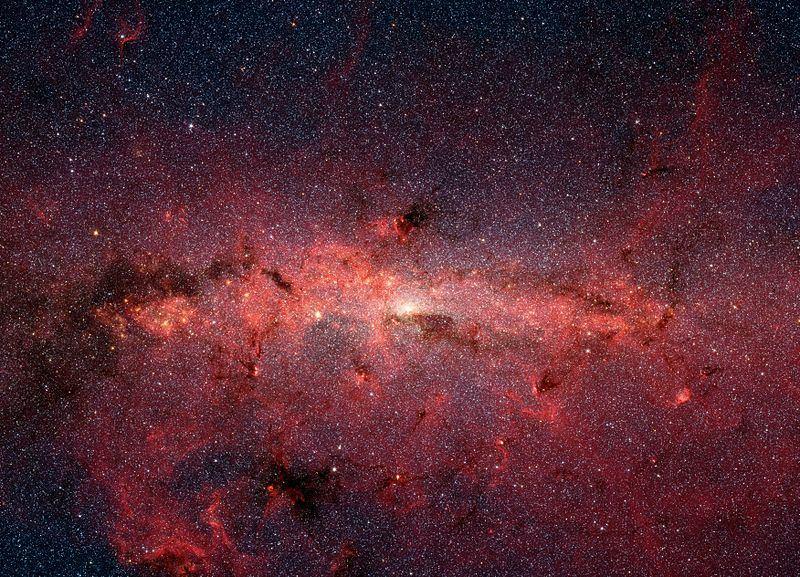 Εικόνα της περιοχής του κέντρου του Γαλαξία με μη πραγματικά χρώματα όπως τραβήχτηκε από το Spitzer Space Telescope της NASA.