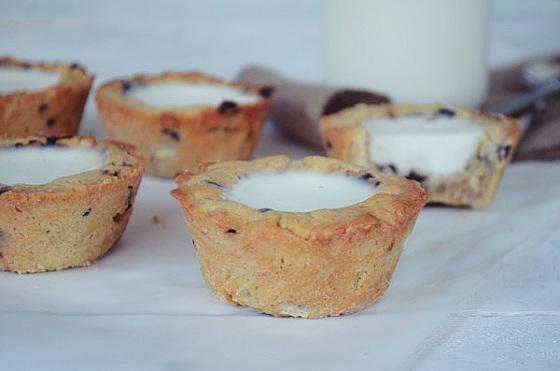 Directions For the cookie cups: In the bowl of an electric mixer fitted with the paddle attachment, cream together the sugars and butter for 5 minutes.