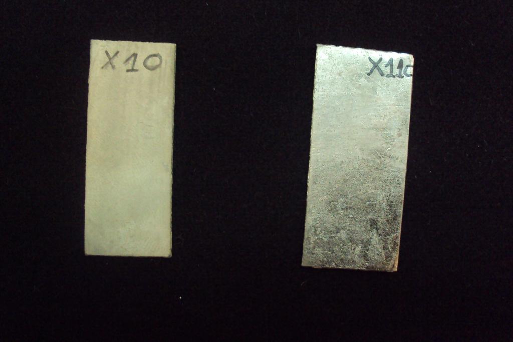 Χ 11 C σύνθετα επινικελωµένο δοκίµιο µε συµπαγή επικάλυψη που το προστατεύει και το αφήνει αναλλοίωτο µετά από δοκιµή Tafel, µε ακόµη καλύτερα αποτελέσµατα από Χ 10. Σχήµα 7.
