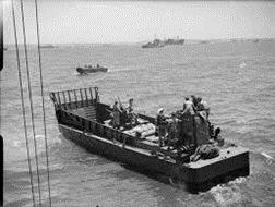 One report states that she was scuttled after the war, but damage to her hull forward of the starboard aft deck would suggest she was sunk by shell