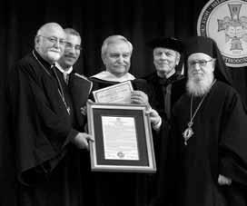 Andrew A. Athens. Also shown is Fr. Nicholas C.