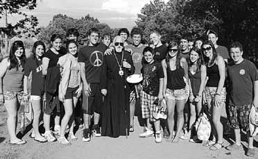 THE METROPOLIS ACTIVITIES (above) Metropolitan Gerasimos is surrounded by campers and staff during a