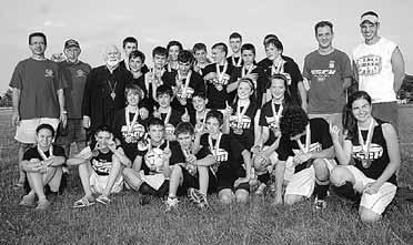 (below) Metropolitan Isaiah of Denver gathers with campers during a session of Camp Emmanuel, the