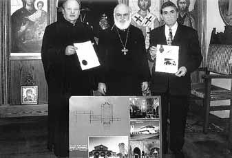 Gary Esper, president of Assumption Church in Erie, PA display the church s Design of Merit award