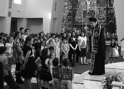 to the children during Holy Week at Sts.