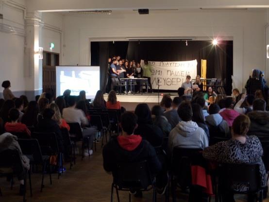 Την εκδήλωση ανέλαβαν οι μαθητές της Γ Λυκείου του Ελληνικού Γυμνασίου Λυκείου Λονδίνου, στα πλαίσια της οποίας παρουσίασαν: Εισαγωγική παρουσίαση video: «Σκηνές από μέρες και νύχτες μιας εξέγερσης».
