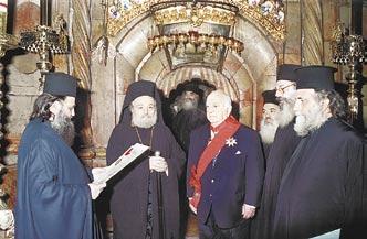 22 Patriarch of Jerusalem honors Andrew Athens PATRIARCH OF JERUSALEM and All of Palestine Ireneos honors World SAE President Andrew A. Athens with the Grand Cross at the Holy Sepulcher following Mr.