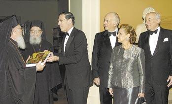 The following day began with the United Nations diplomats breakfast, followed by his address at the Metropolitan Museum. ARCHONS present a gift to Patriarch Bartholomew during a dinner in his honor.