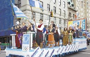 Leading the Parade are Archbishop Demetrios and NY Mayor Michael Bloomberg holding young Eleni Kloni from Brooklyn.