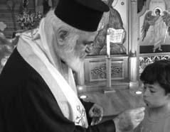 His Eminence anointing JOY Campers.