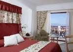 Facilitati hotel: Hotelul pune la dispozitia turistilor restaurant (international si grecesc), taverna cu specific italian si grecesc, gelaterie, disco, piano bar, piscina cu sezlonguri si umbrele,