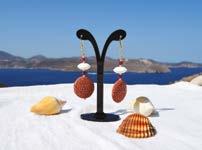 For household, carefully selected artistic ceramic or glass creations - fused or blown, unique wall clocks, throws, lamps and souvenirs from Milos.