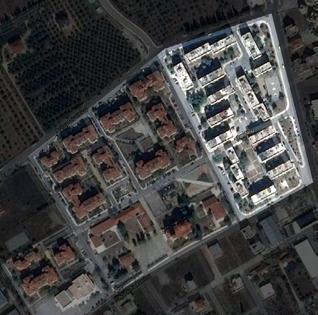 οικοκοινότητα. Πιο συγκεκριμένα, επιλέχθηκε η τοποθεσία του πιο παλιού συγκροτήματος εργατικών κατοικιών του δήμου Βόλου, στην περιοχή Ξηροκάμπου της Ν. Ιωνίας.