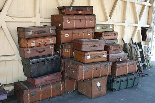 While waiting for a taxi with piles of luggage to their side, a crowd of people gathered curiously thinking the three men were going on a transatlantic journey.