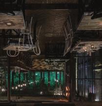 Camouflaging the small size of the place through the use of an atrium in the rear part of Feedel interior and transforming it by means of various Mediterranean plants and playful lighting, the