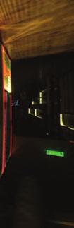 The entire left part of the club is covered by multi-colored ropes in strong colors, creating different strips in the metal canvas