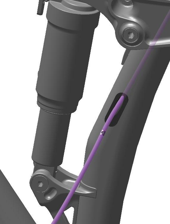6 Pull the housing and remote hose through the seat tube and out the frame hose port. Stop when the seatpost is just above the seat tube.