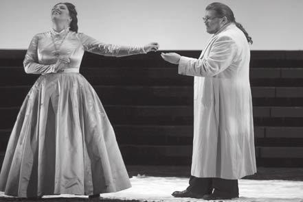 THE GREEK PRESS October 26, 2007 27ïò ñüíïò Page 19 OPERA REVIEW DON CARLOS MEETS THE FASCISTS AND THE KU KLUX KLAN IN GRAND STYLE The Canadian Opera Company has launched its second season at The