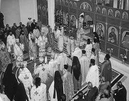 Τὸ ἑσπέρας, ἐψάλη ἡ Ακολουθία τοῦ Αγιασμοῦ καὶ ἀργότερα ὁ Μέγας Πανηγυρικὸς Εσπερινός, συγχοροστατούντων ἐν συνόλῳ δώδεκα Αρχιερέων, μετὰ Λιτῆς, Αρτοκλασίας καὶ θείου κηρύγματος ὑ-