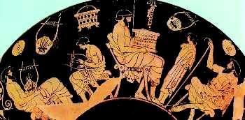 2. Σχολείο στην αρχαία Αθήνα. Ο κιθαριστής και ο γραμματιστής κάνουν μάθημα. Στην άκρη δεξιά κάθεται ο παιδαγωγός. Απεικόνιση από ερυθρόμορφο αγγείο του 5ου αιώνα π.χ. (Αρχαιολογικό Μουσείο του Βερολίνου).