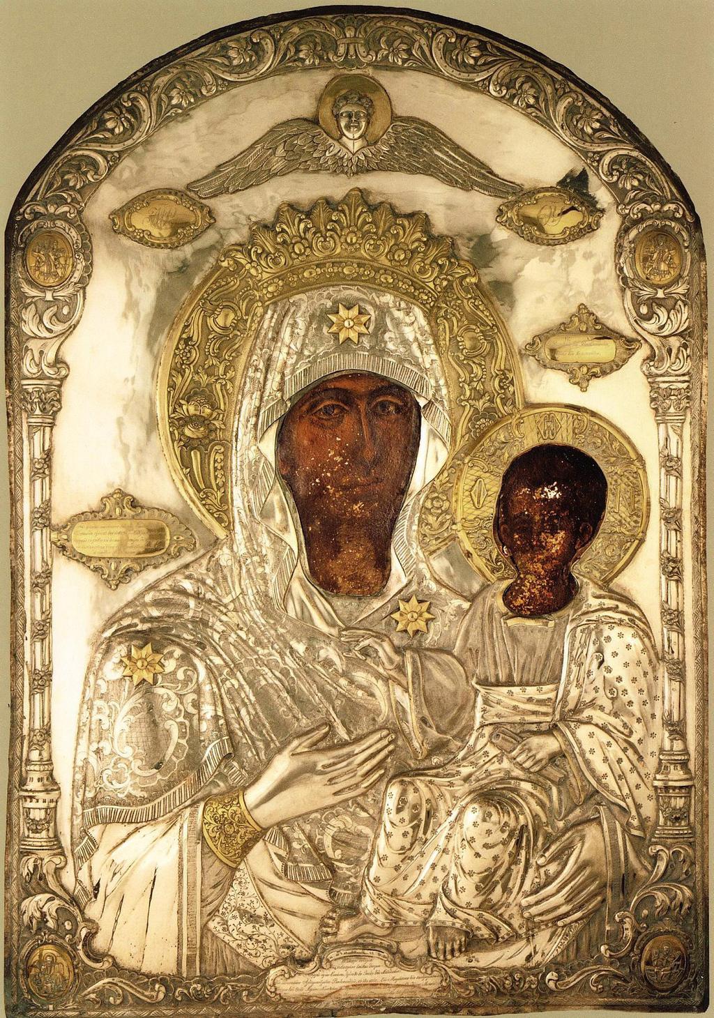 Numărul 6 / Maica Domnului / Septembrie 2013 tânăr, intrând în biserică și mergând să se închine la icoană, văzu cum deodată chipul Maicii Domnului străluci ca fulgerul, moment în care o putere
