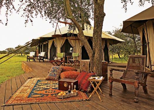 Singita Sabora Tented Camp Singita Sabora Tented Camp Φ αντάσου να απολαμβάνεις τα εξπρεσιονιστικά χρώματα του ηλιοβασιλέματος πάνω από τη σαβάνα της Τανζανίας, καθισμένος αναπαυτικά στο στρωμένο με