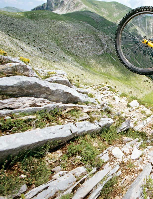 DISCOVER GREECE Vangelis Efthymiou VICIOUS CYCLES The seisachtheia (relief of burdens) paradox: carrying the bicycle for the journey s most impassable sections while also unloading all your troubles
