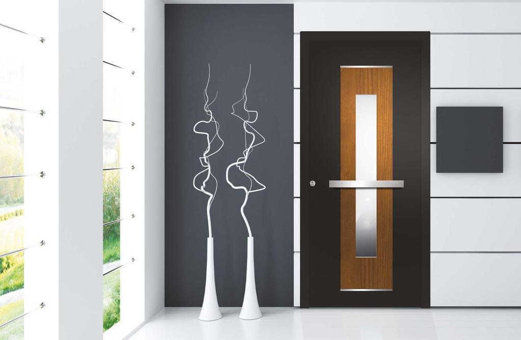 Model PLD7 Μια πόρτα αρχιτεκτονικού σχεδιασμού. Στη διαμόρφωση της επεμβαίνει το γυαλί σαν κυρίαρχο κεντρικό στοιχείο και η υφή ξύλου, σε συνδυασμό με την inox χειρολαβή.