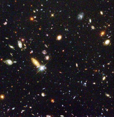 The observe universe glies srs per gly M per gly 4 Gpc o he ege of he visible universe Composiion. Mer.